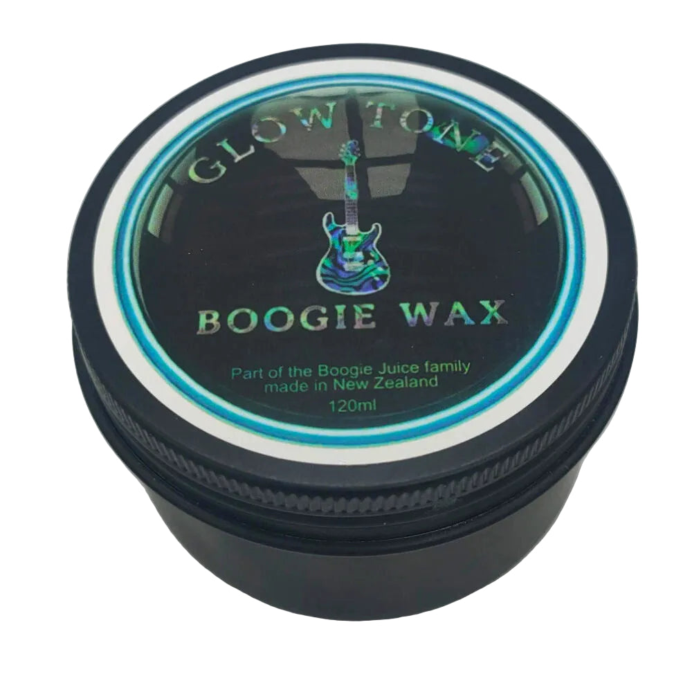 Black container of Glow Tone Boogie Wax on a white background
