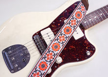 Load image into Gallery viewer, Couch Straps Cork and Orange Flowers Hippie Weave Guitar Strap
