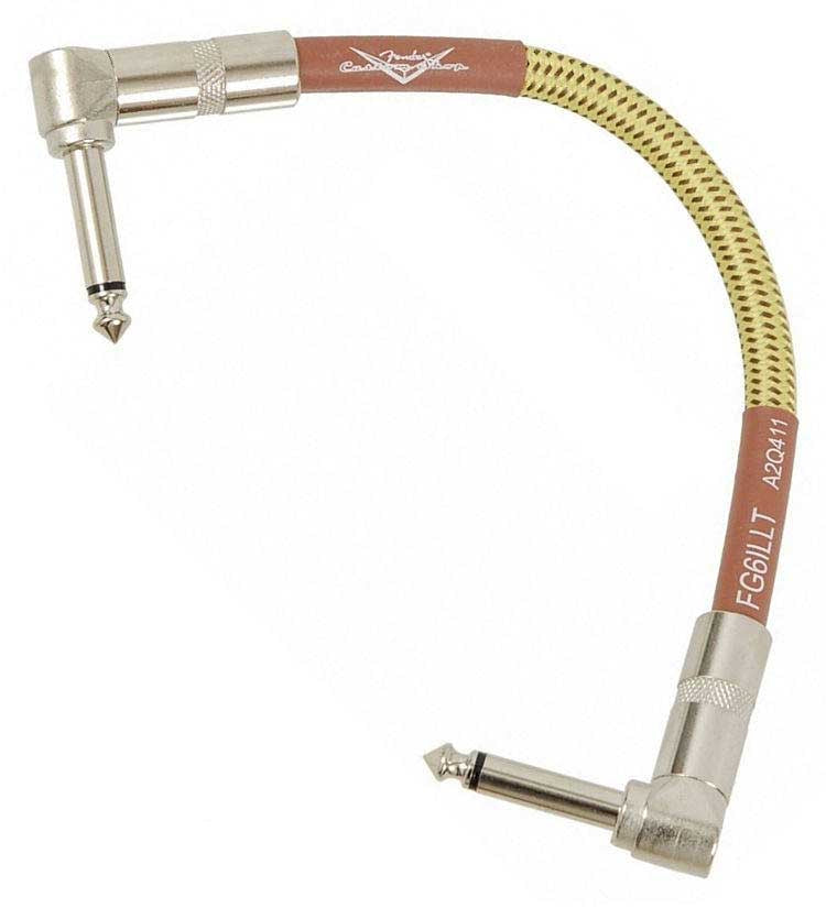 A 6-inch Fender Custom Shop tweed wrapped patch cable with connectors at both ends.