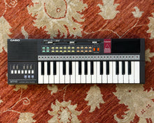 Load image into Gallery viewer, Casio Casiotone MT-18 w/ 3 ROM Packs
