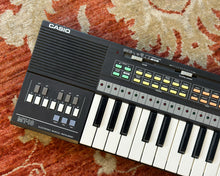 Load image into Gallery viewer, Casio Casiotone MT-18 w/ 3 ROM Packs
