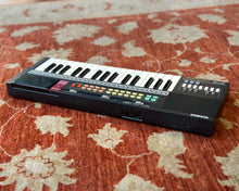 Load image into Gallery viewer, Casio Casiotone MT-18 w/ 3 ROM Packs
