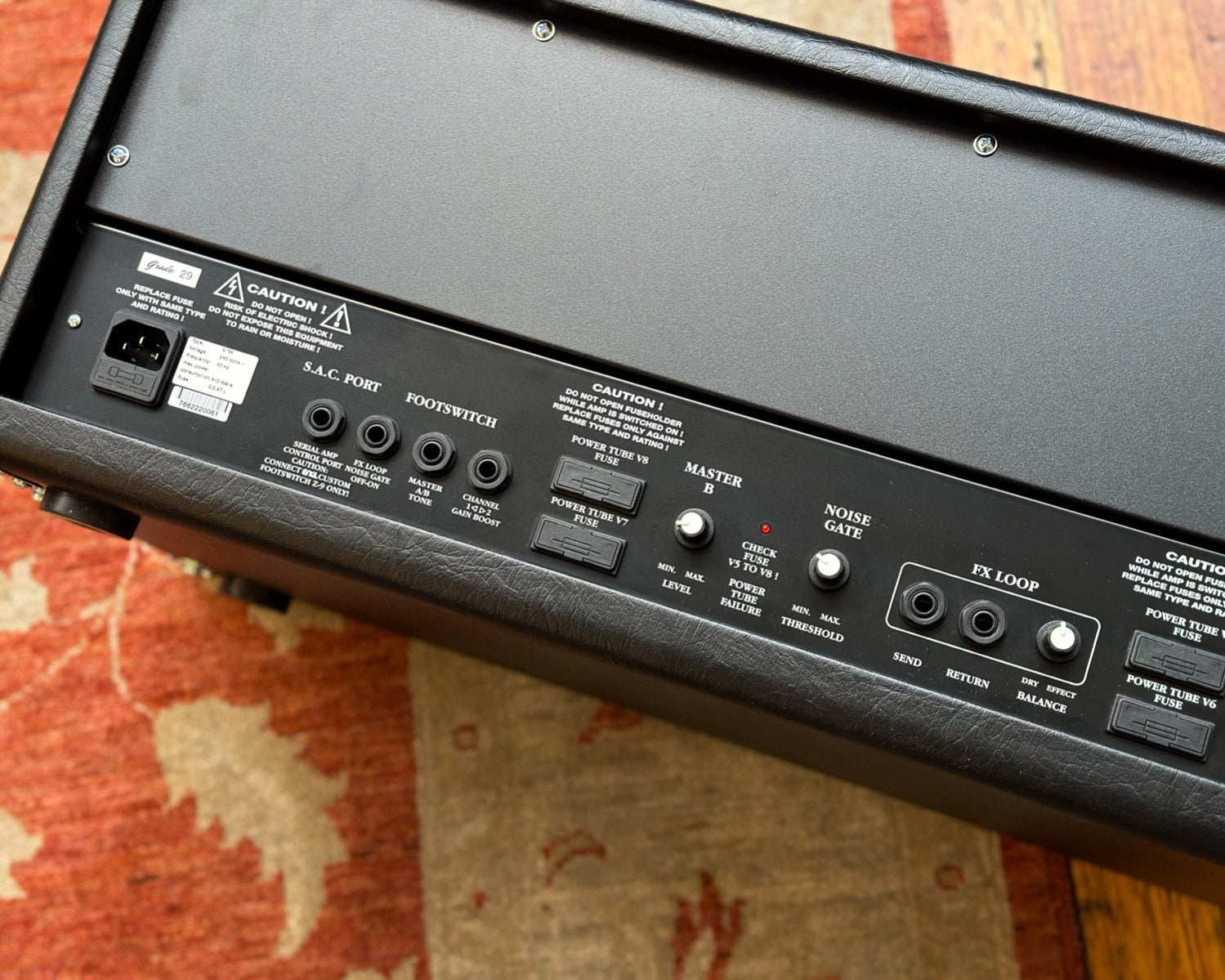 Back panel of ENGL Marty Friedman 100W Inferno with various control labels on a textured surface