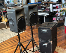 Load image into Gallery viewer, Mackie SRM450 Powered Speakers - Pair w/ Flight Cases &amp; Stands
