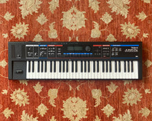 Load image into Gallery viewer, Roland Juno Di Mobile Synthesizer with Song Player
