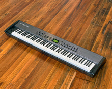 Load image into Gallery viewer, Roland RD-700 Digital Stage Piano
